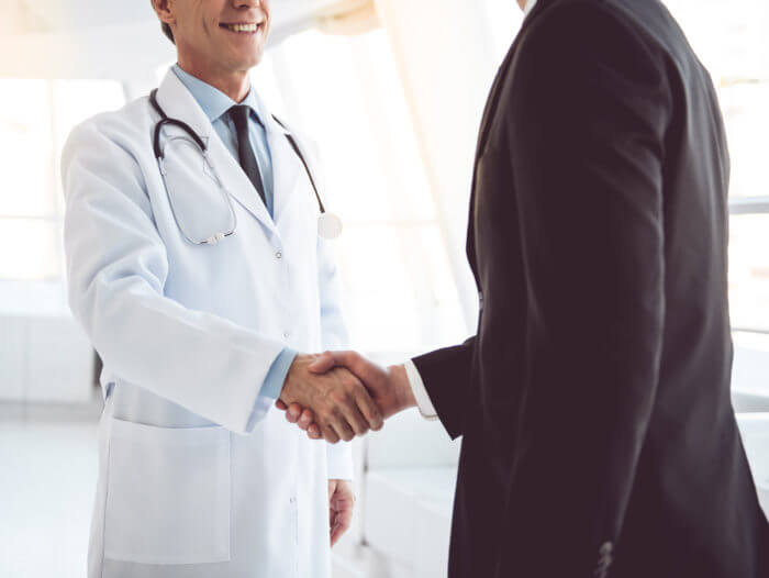 EHR-partners-doctors-shaking-hands
